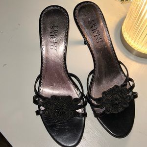 Black size 8 woman’s heels with flower design on top